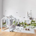 The Rabbits Playground leikkimielinen metsaelaintapetti lastenhuoneeseen Rebel Wallsilta R14551