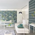 Designers Guildin sininen metsatapetti Madhya