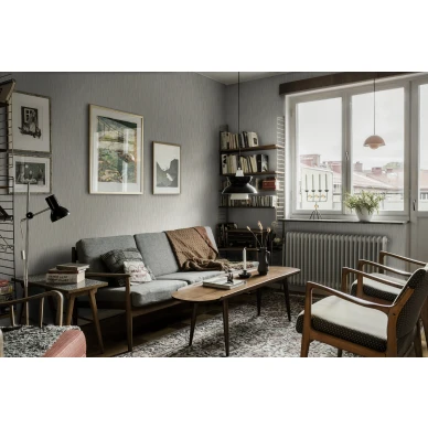 Olohuoneen retrotapetti harmaalla geometrisella kuviolla Angby Borastapetilta 4178 kuva