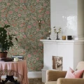 Borastapeter Kamelia 5729 vihrea kukkatapetti olohuoneessa